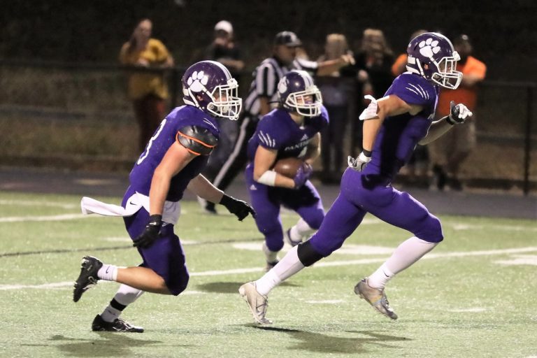 Panthers, Trojans tangle in key styles clash