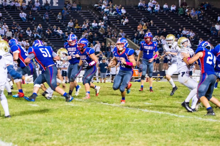 Mohawks run, and pass, way past Titans