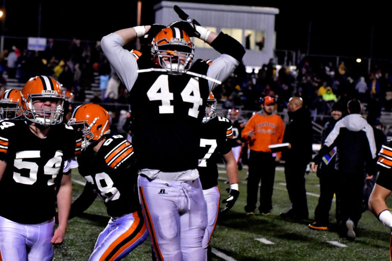 Fighting Tigers rough up Roughriders in state semi, on to Canton